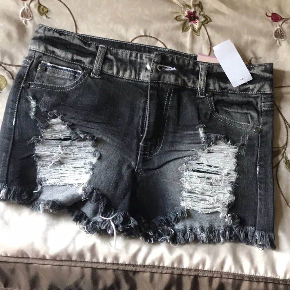Black low rise ripped shorts